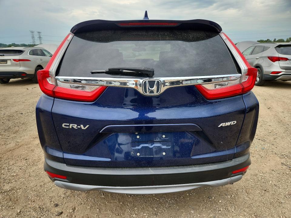 Photo 6 from auction – 2019 HONDA CR-V with VIN 7FARW2H88KE015379
