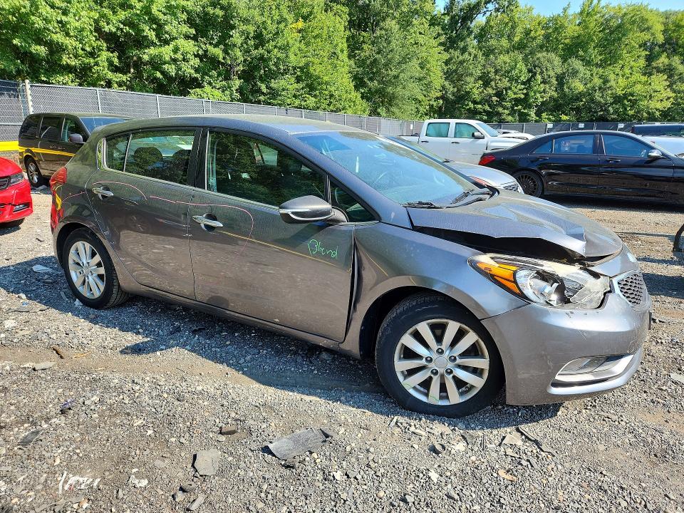 Photo 4 from auction – 2014 KIA FORTE with VIN KNAFX5A80E5165884