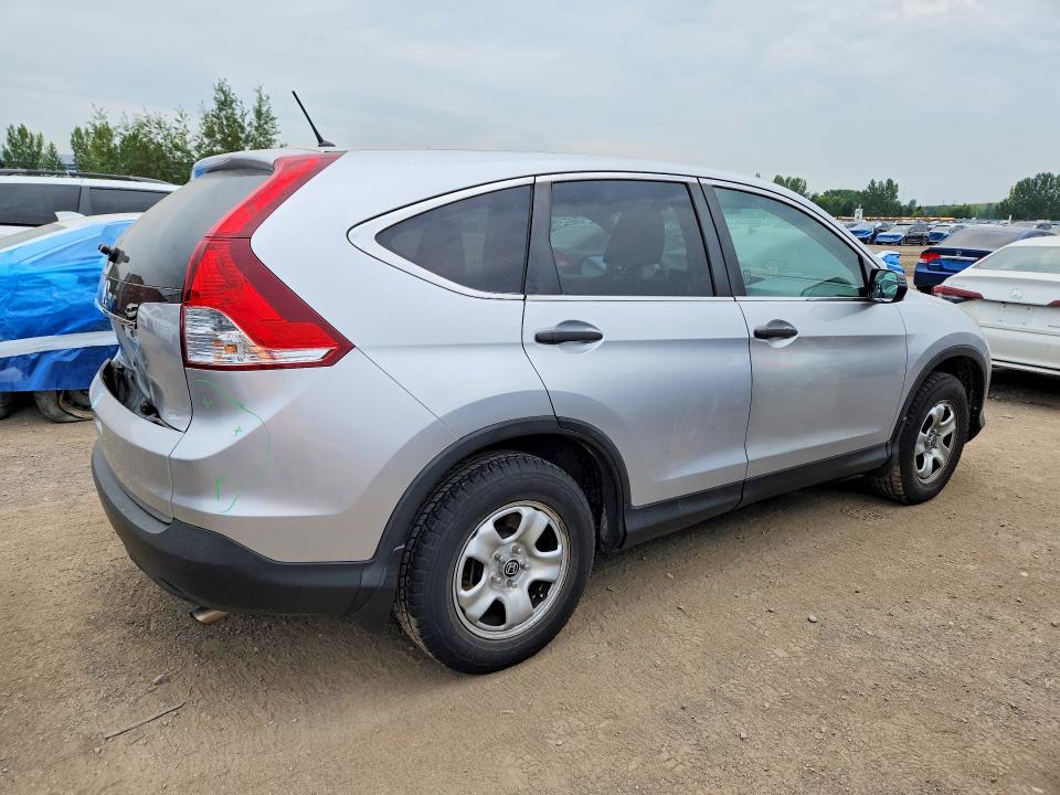 Photo 3 from auction – 2014 HONDA CR-V with VIN 2HKRM3H33EH003156