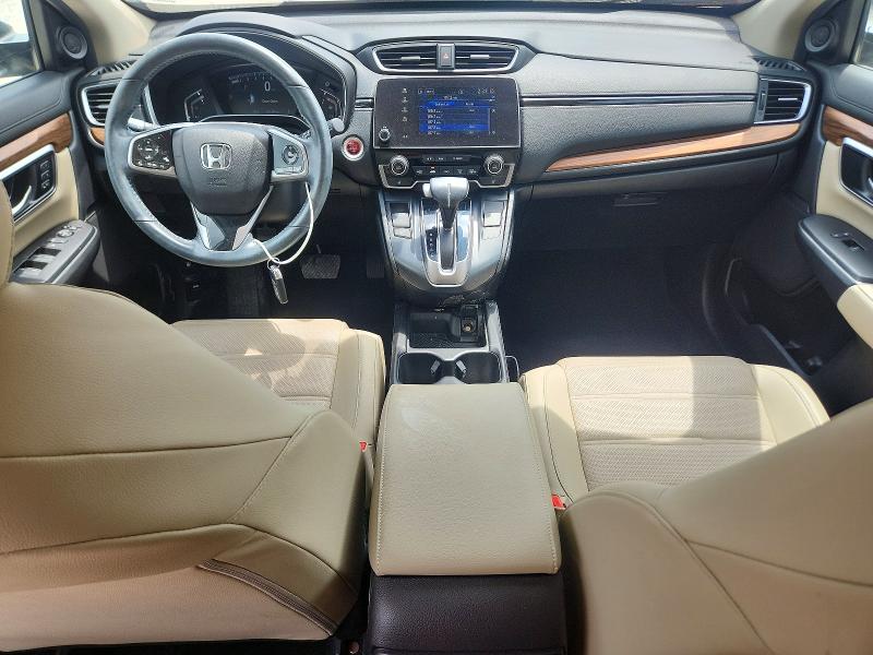 Photo 8 from auction – 2019 HONDA CR-V with VIN 7FARW1H84KE023277