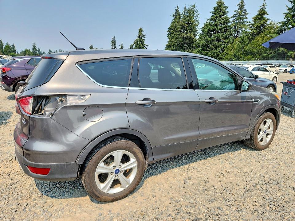 Photo 3 from auction – 2014 FORD ESCAPE with VIN 1FMCU9G94EUB32605