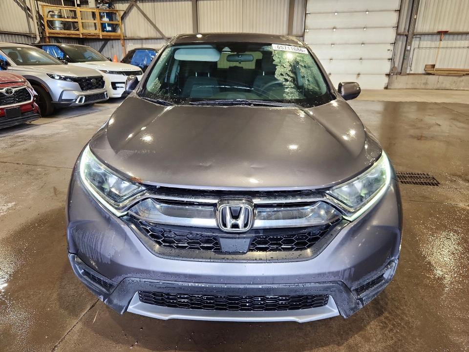 Photo 5 from auction – 2017 HONDA CR-V with VIN 2HKRW2H23HH108683