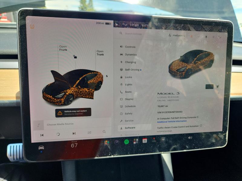 Photo 9 from auction – 2022 TESLA MODEL 3 with VIN 5YJ3E1EB4NF135053