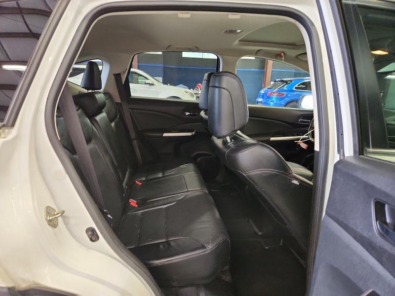 Photo 11 from auction – 2016 HONDA CR-V with VIN 5J6RM4H71GL043690