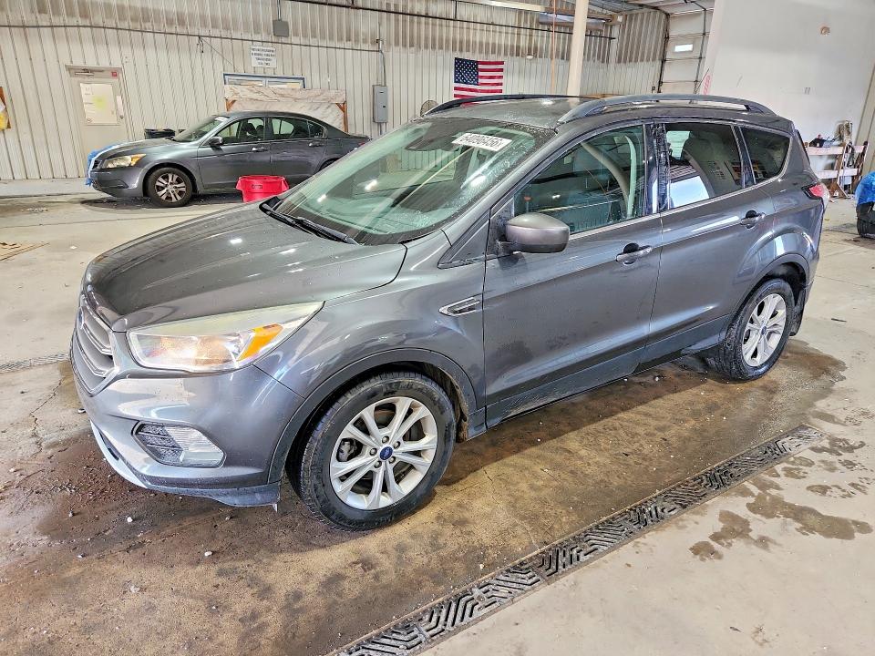 FORD ESCAPE 2018 with VIN 1FMCU0GD3JUB84950 - Photo from auction