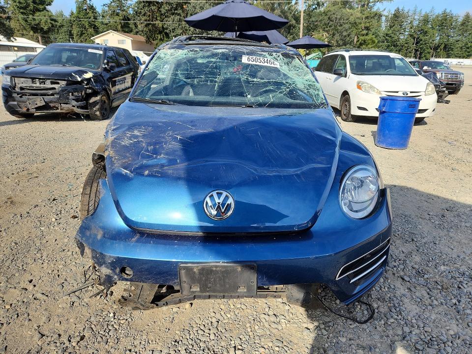 Photo 5 from auction – 2018 VOLKSWAGEN BEETLE with VIN 3VWJD7AT3JM709088
