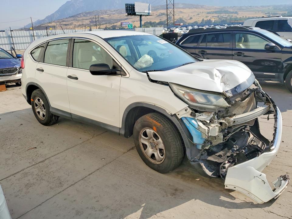 Photo 4 from auction – 2016 HONDA CR-V with VIN 5J6RM4H35GL138170