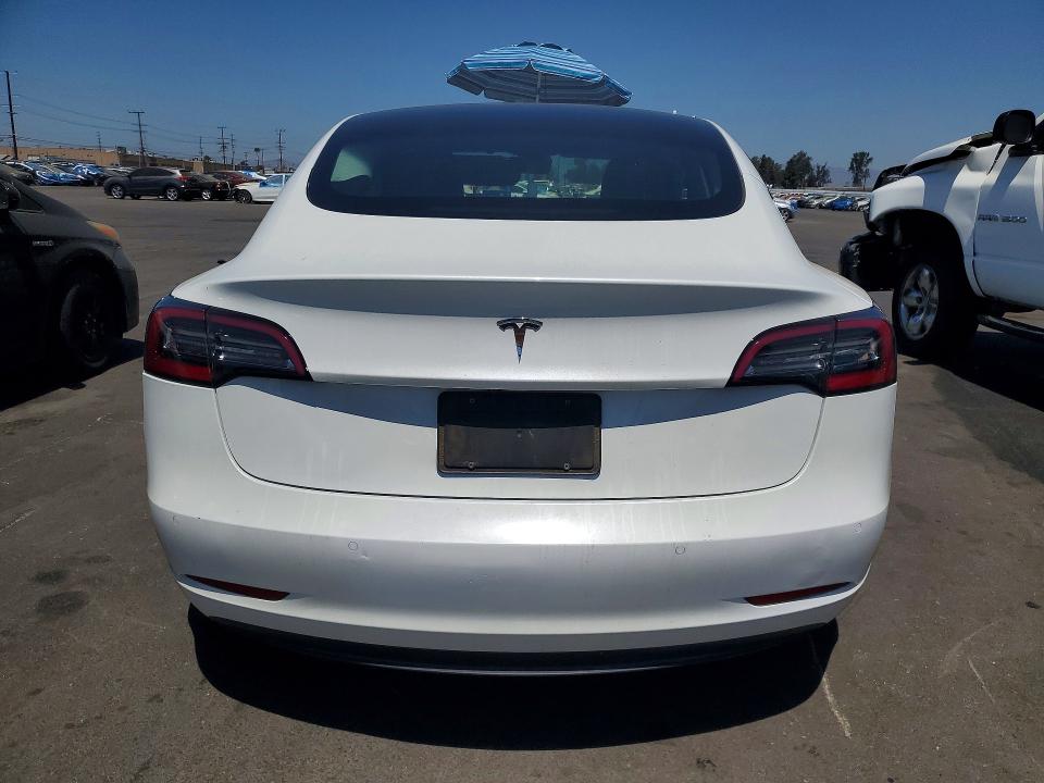 Photo 6 from auction – 2022 TESLA MODEL 3 with VIN 5YJ3E1EA5NF154573