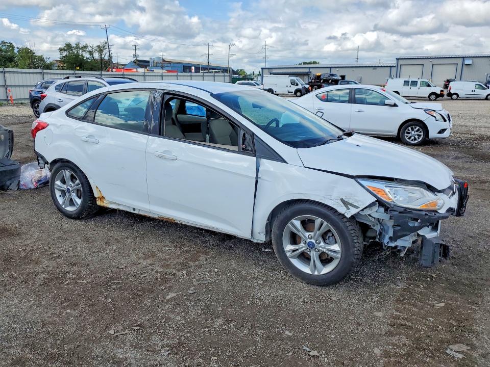 Снимка 4 от търг – 2014 FORD FOCUS с VIN 1FADP3F24EL286342