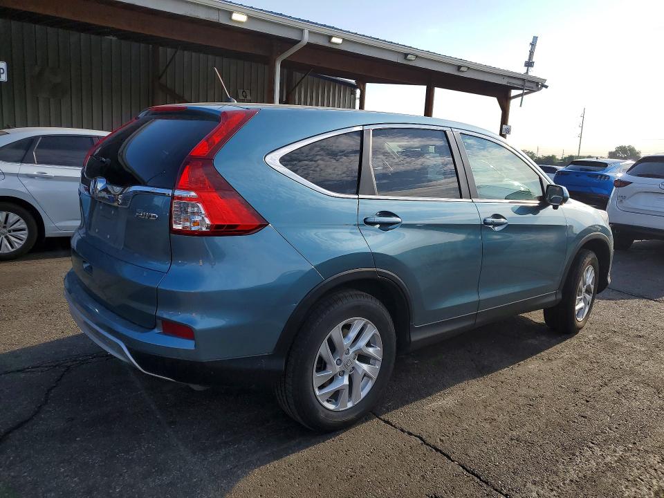 Photo 3 from auction – 2015 HONDA CR-V with VIN 2HKRM4H50FH688421