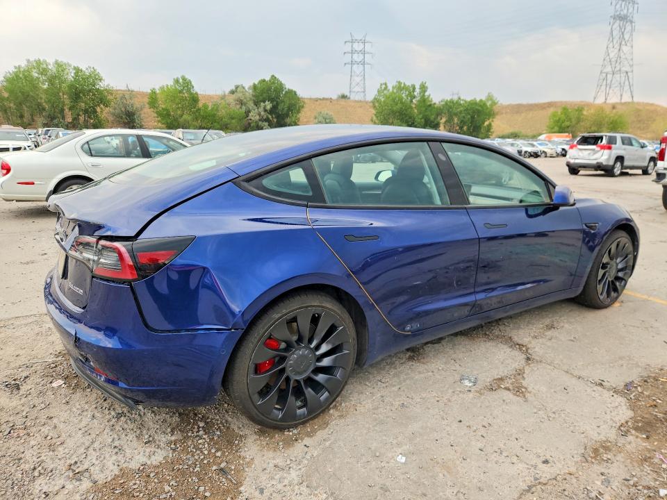 Photo 3 from auction – 2022 TESLA MODEL 3 with VIN 5YJ3E1EC6NF274402