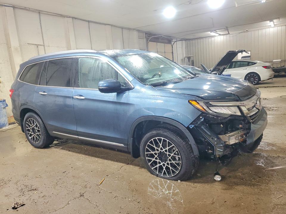 Photo 4 from auction – 2022 HONDA PILOT with VIN 5FNYF6H01NB003670