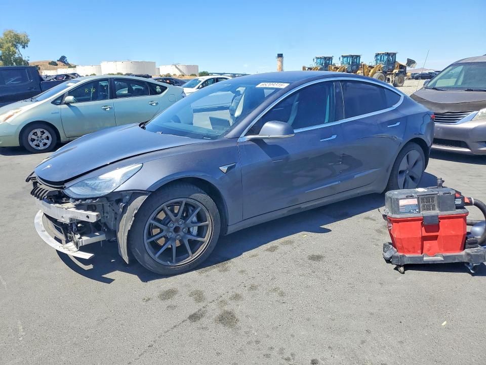 TESLA MODEL 3 2018 with VIN 5YJ3E1EA7JF038205 - Photo from auction