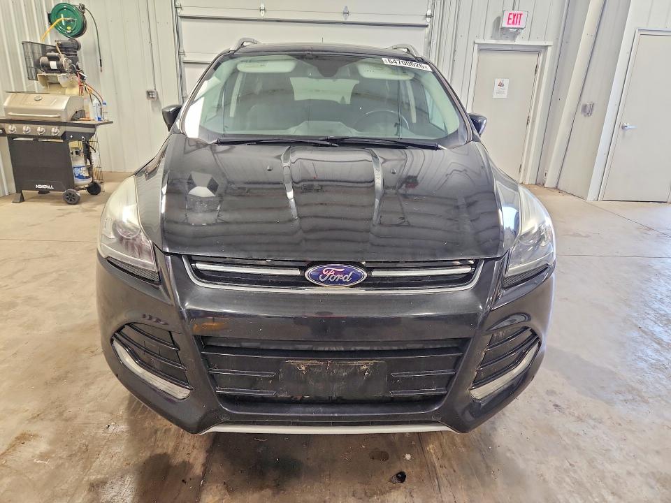 Photo 5 from auction – 2014 FORD ESCAPE with VIN 1FMCU9J91EUD93165