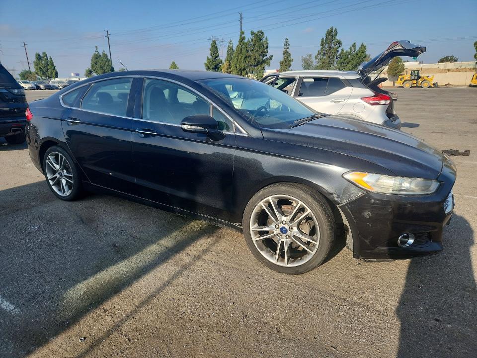 Photo 4 from auction – 2015 FORD FUSION with VIN 3FA6P0K99FR281005