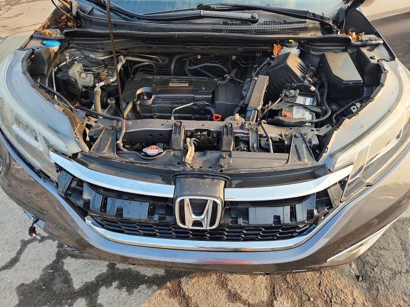 Photo 12 from auction – 2016 HONDA CR-V with VIN 2HKRM4H50GH672673