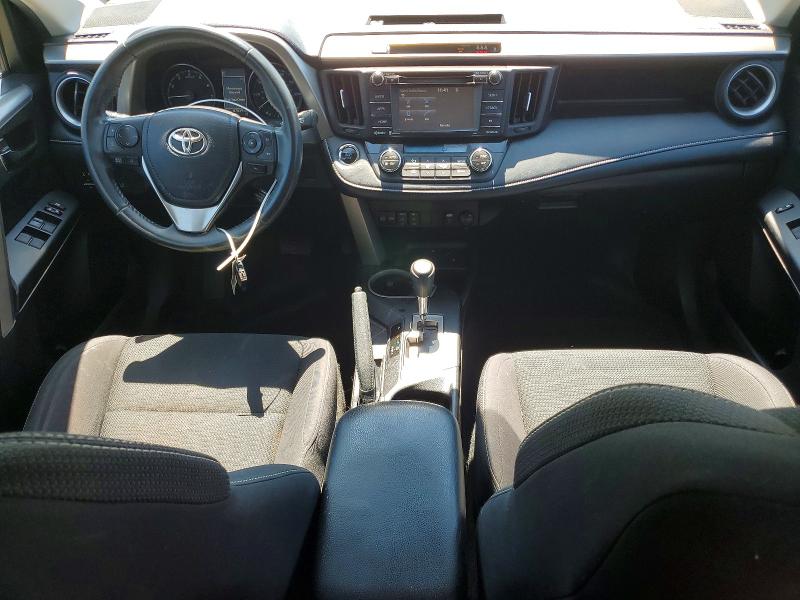 Photo 8 from auction – 2018 TOYOTA RAV4 with VIN 2T3RFREV2JW756960