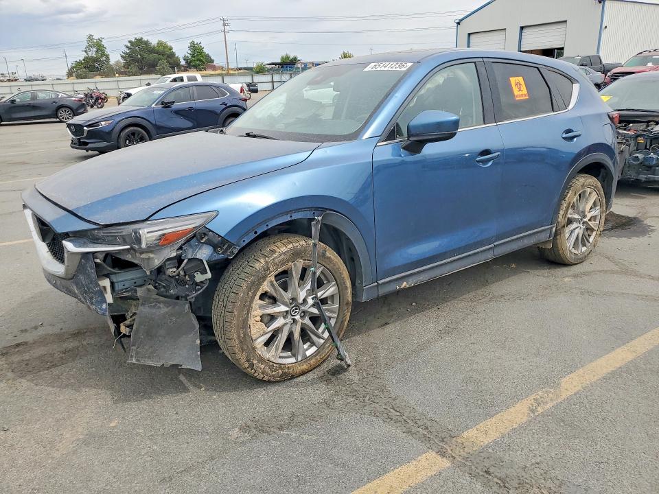 MAZDA CX-5 2021 with VIN JM3KFBDM3M0380058 - Photo from auction