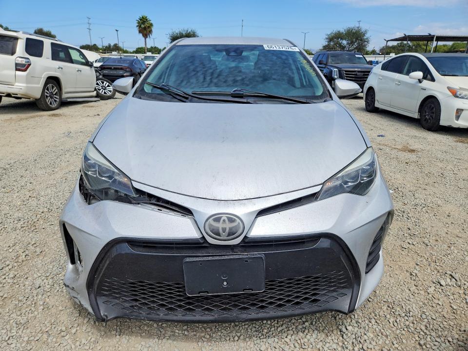 Photo 5 from auction – 2018 TOYOTA COROLLA with VIN 5YFBURHEXJP745637