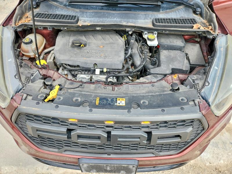 Photo 11 from auction – 2018 FORD ESCAPE with VIN 1FMCU9GD6JUA22816