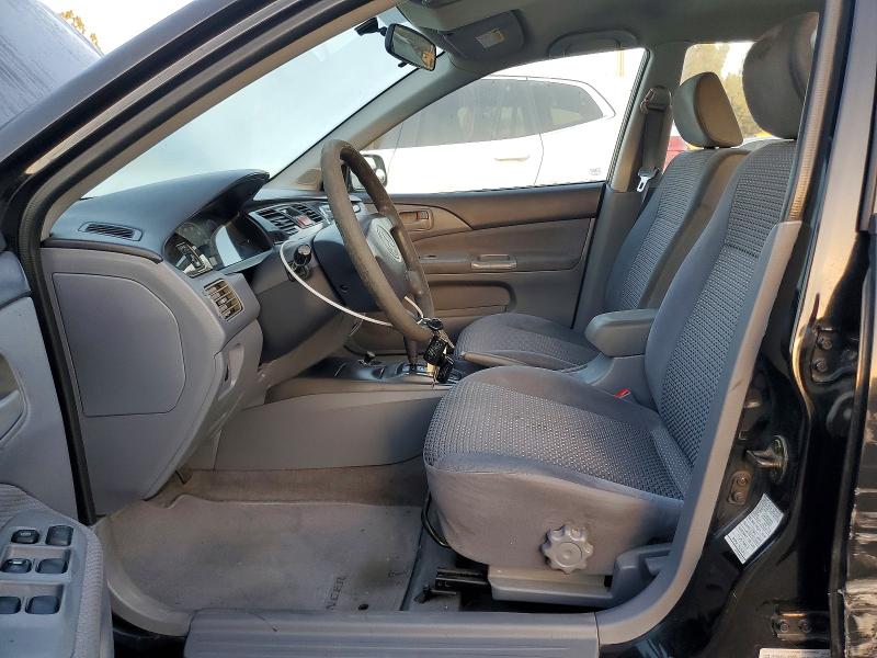 Снимка 7 от търг – 2002 MITSUBISHI LANCER с VIN JA3AJ36E92U080415