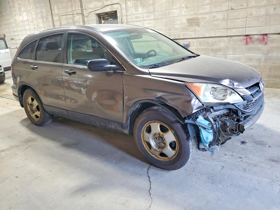 Photo 4 from auction – 2011 HONDA CR-V with VIN 5J6RE4H35BL050242