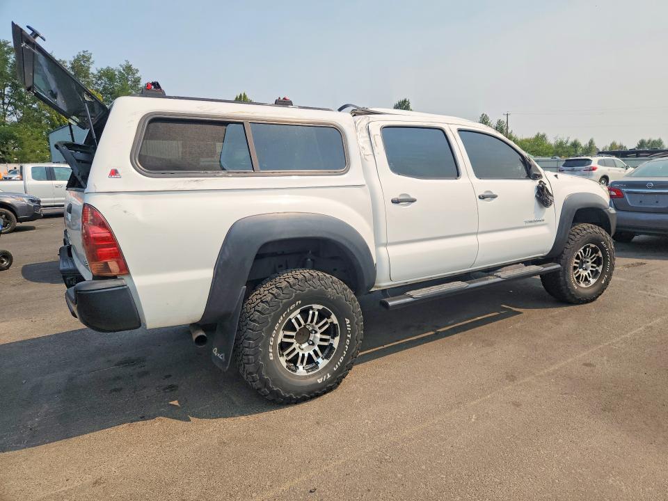 Photo 3 from auction – 2014 TOYOTA TACOMA with VIN 3TMLU4EN6EM135713