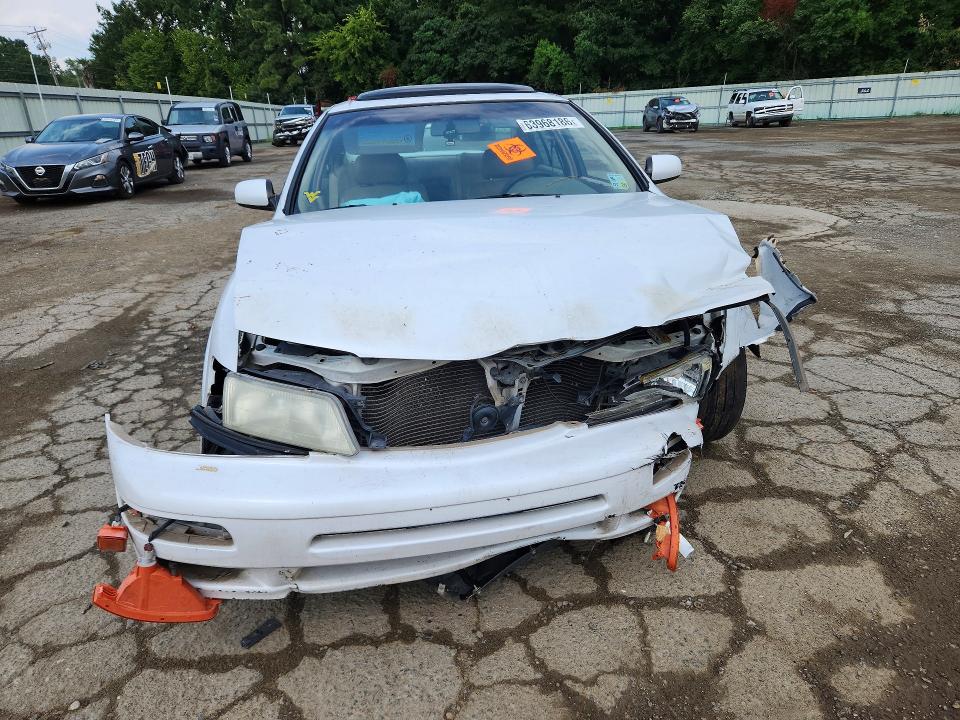 Photo 5 from auction – 1998 NISSAN MAXIMA with VIN JN1CA21A7WT302991
