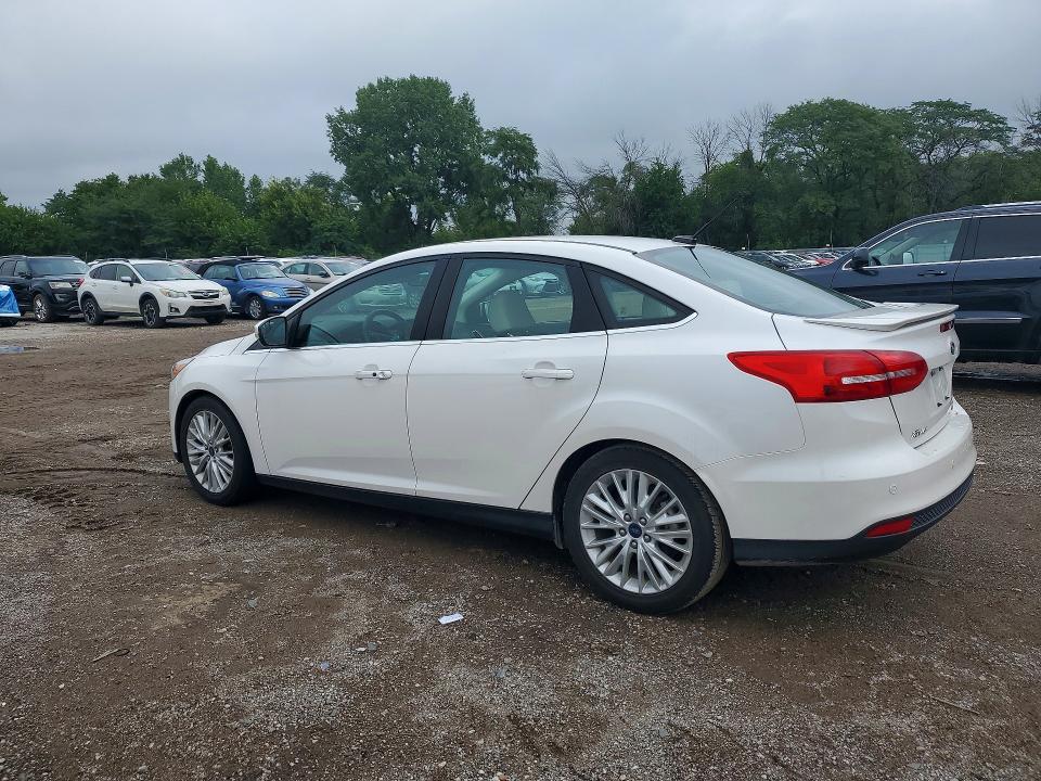 Photo 2 from auction – 2015 FORD FOCUS with VIN 1FADP3J28FL299913