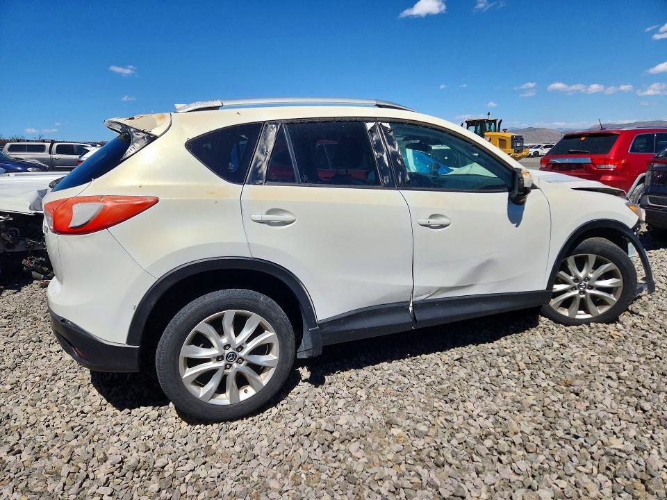 Photo 3 from auction – 2014 MAZDA CX-5 with VIN JM3KE2DY5E0332892