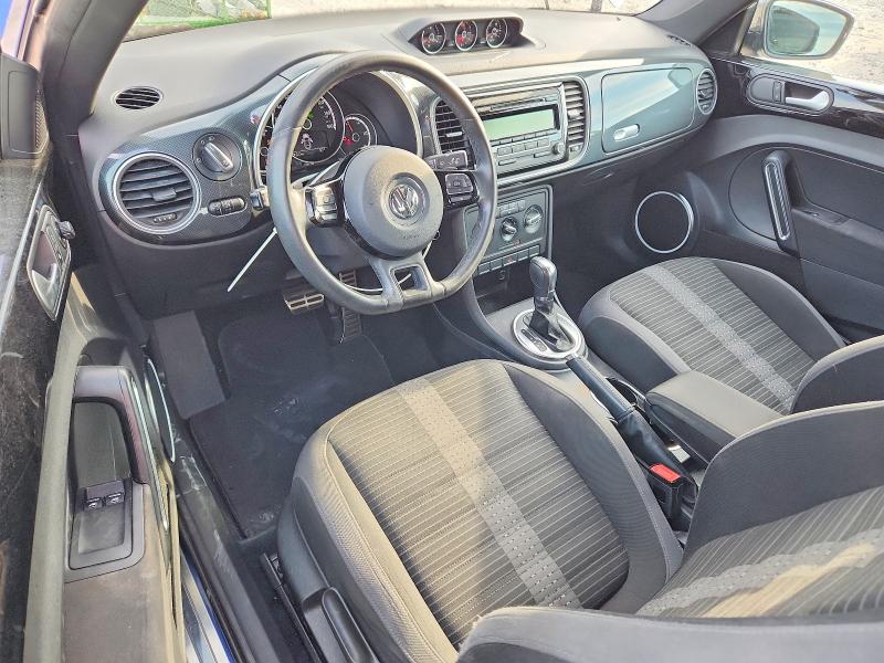 Photo 8 from auction – 2014 VOLKSWAGEN BEETLE with VIN 3VWVS7AT8EM662430