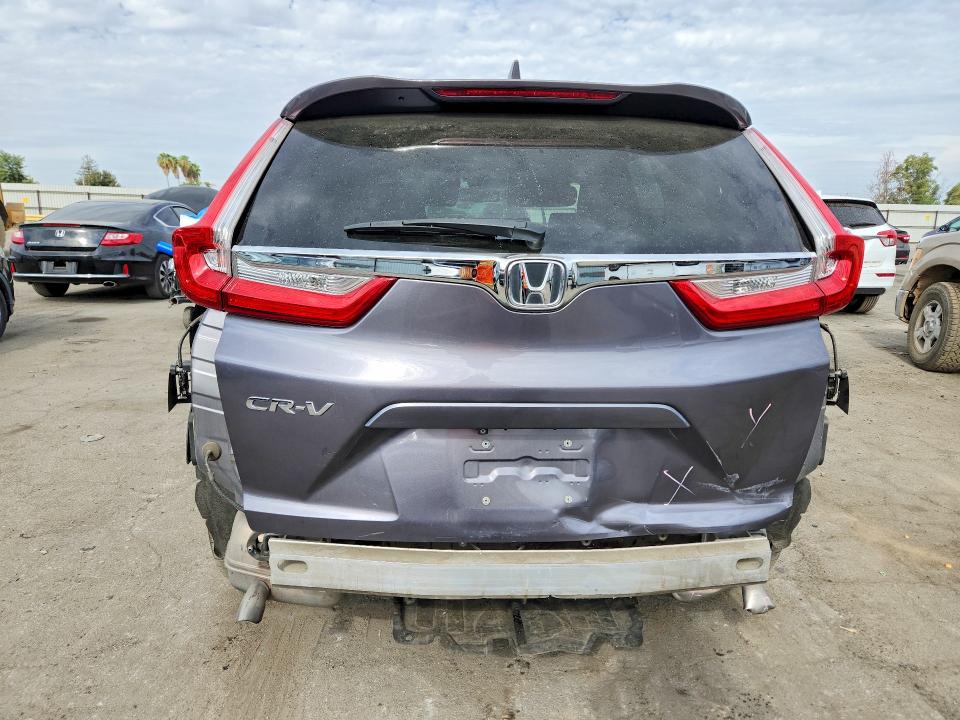 Photo 6 from auction – 2017 HONDA CR-V with VIN 7FARW1H84HE027869