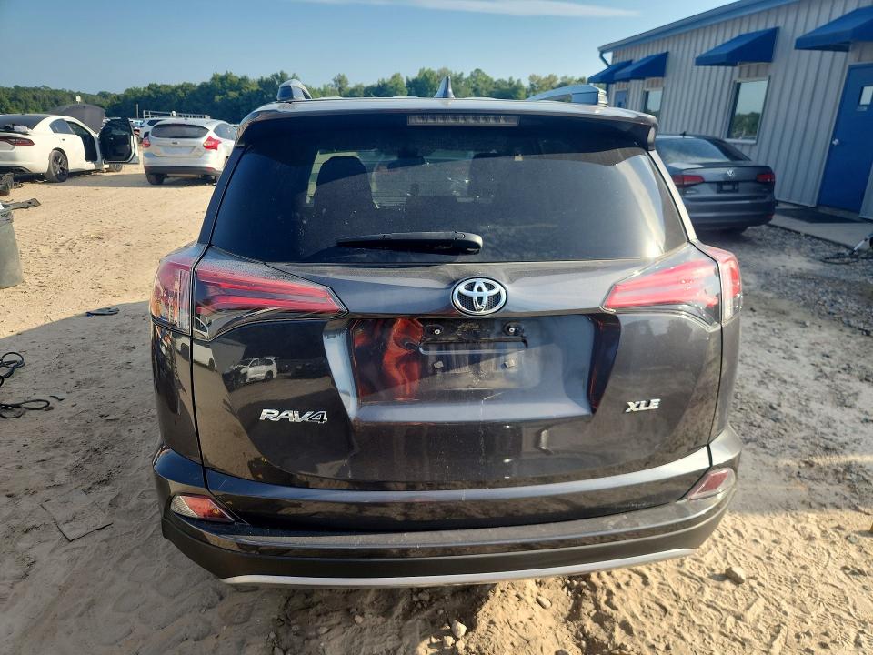 Photo 6 from auction – 2018 TOYOTA RAV4 with VIN 2T3WFREV9JW516047