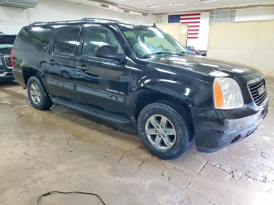 Photo 4 from auction – 2011 GMC YUKON XL with VIN 1GKS2LE39BR343089