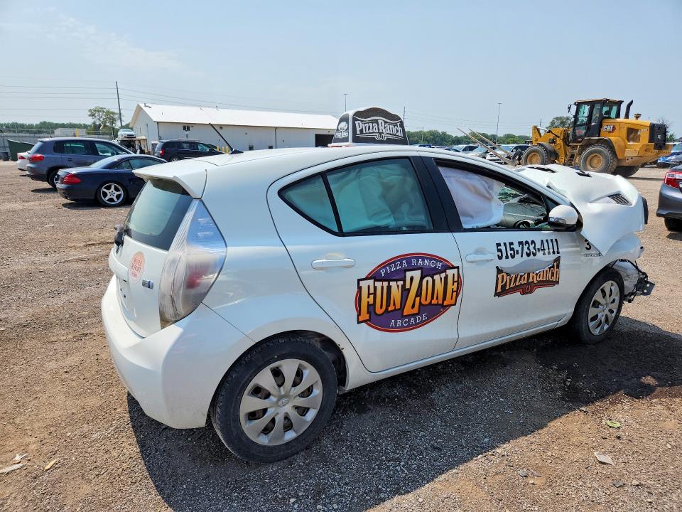 Photo 3 from auction – 2014 TOYOTA PRIUS C with VIN JTDKDTB35E1069578