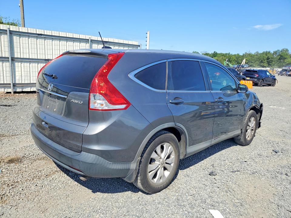 Photo 3 from auction – 2014 HONDA CR-V with VIN 2HKRM4H70EH608115