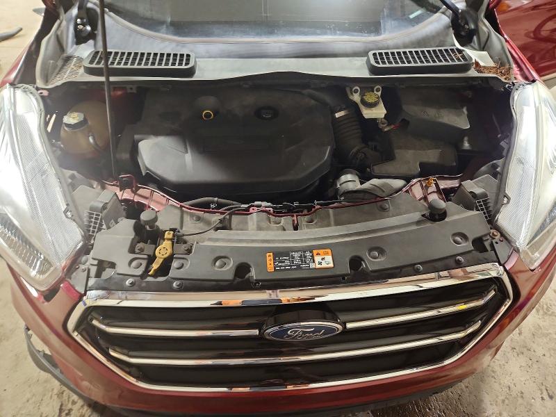 Photo 12 from auction – 2017 FORD ESCAPE with VIN 1FMCU9J92HUB91052