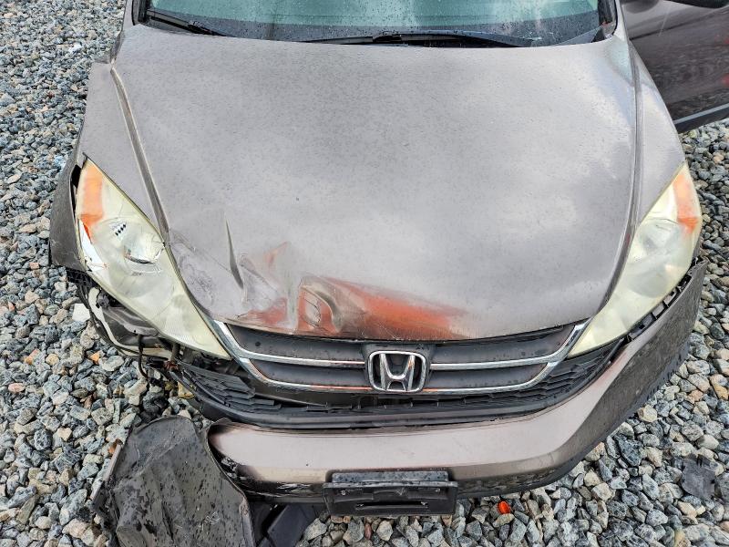 Photo 11 from auction – 2011 HONDA CR-V with VIN 5J6RE4H47BL057136