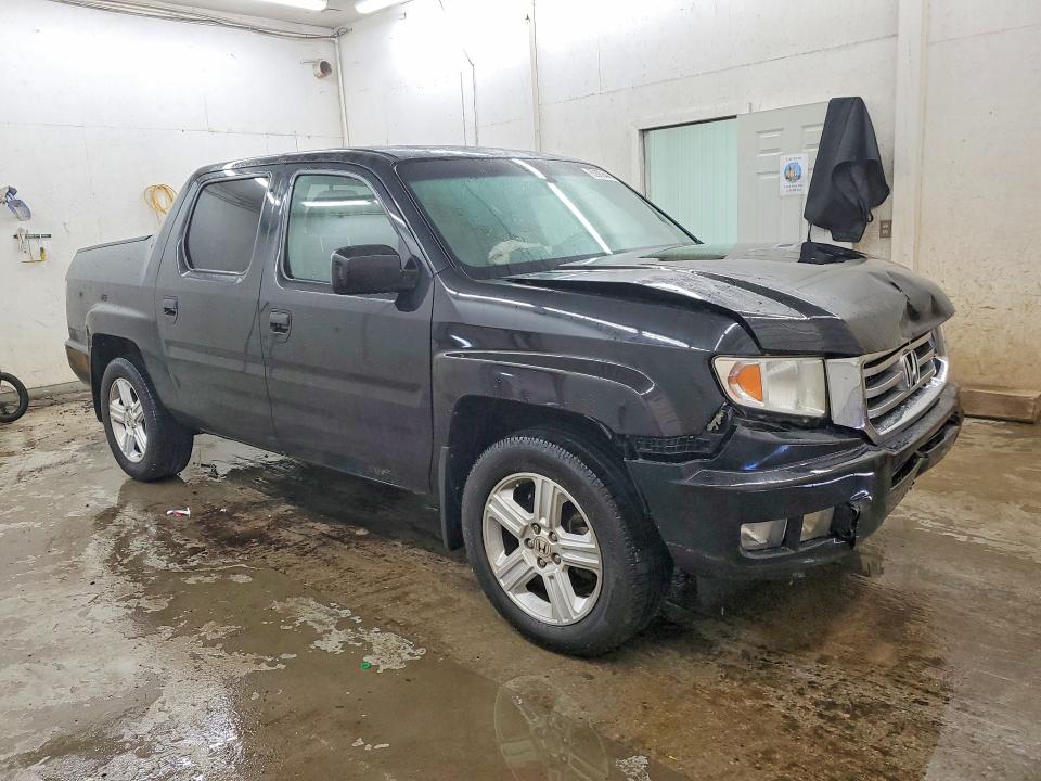 Photo 4 from auction – 2012 HONDA RIDGELINE with VIN 5FPYK1F50CB002236