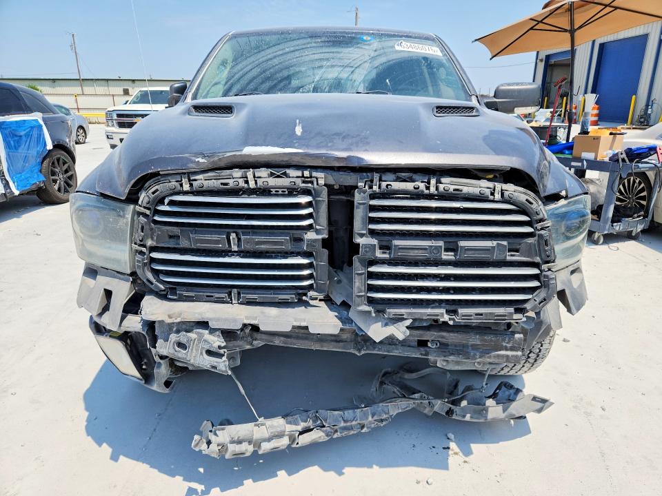 Photo 5 from auction – 2015 RAM 1500 with VIN 1C6RR6MT4FS650510