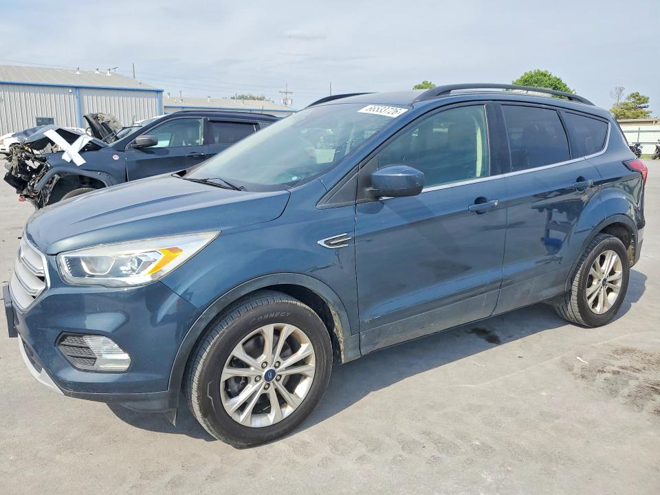 Photo 1 from auction – 2019 FORD ESCAPE with VIN 1FMCU9HD5KUA42782