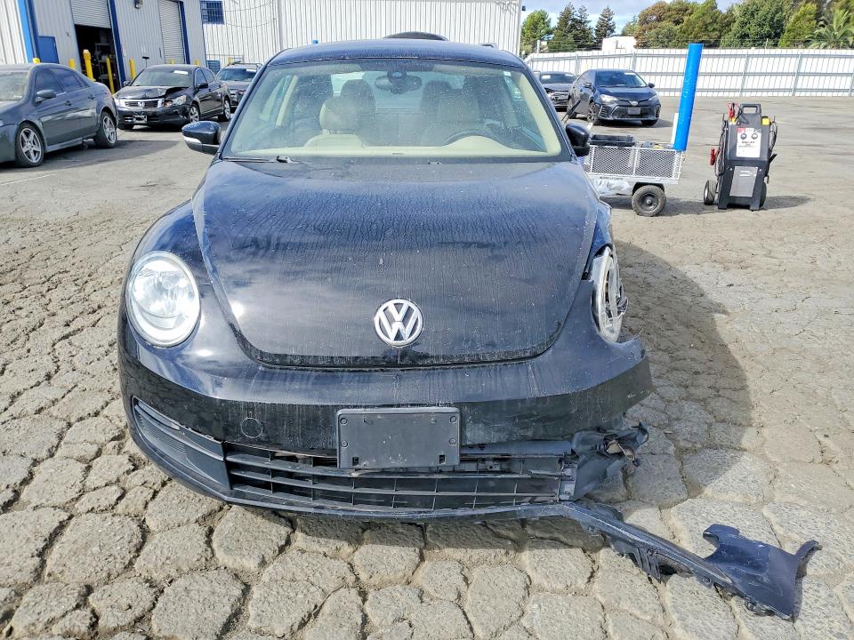 Photo 5 from auction – 2016 VOLKSWAGEN BEETLE with VIN 3VWJ17AT5GM615053