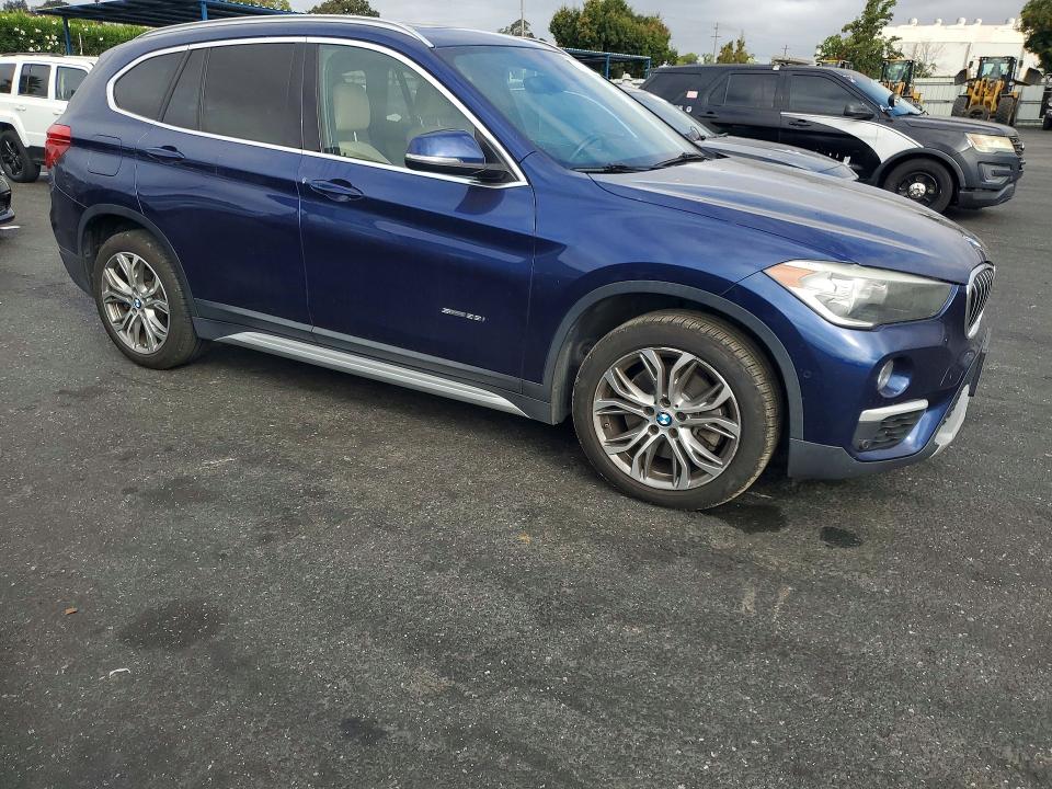 Photo 4 from auction – 2017 BMW X1 with VIN WBXHU7C31H5H35208