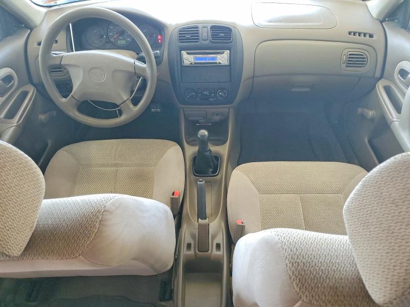 Photo 8 from auction – 1999 MAZDA PROTEGE with VIN JM1BJ222XX0102500