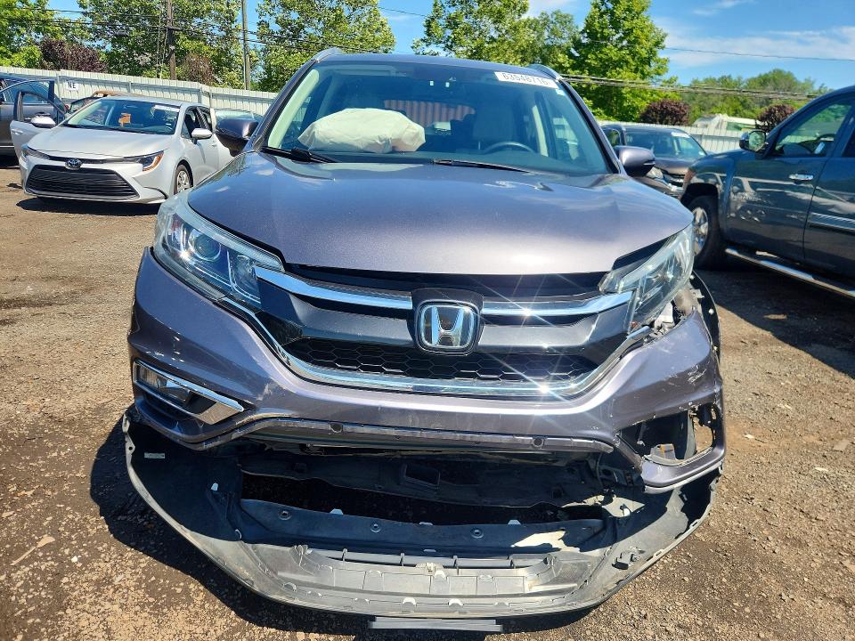 Photo 5 from auction – 2015 HONDA CR-V with VIN 5J6RM4H93FL053802