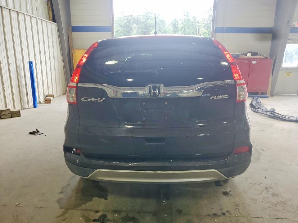 Photo 6 from auction – 2015 HONDA CR-V with VIN 2HKRM4H59FH622661