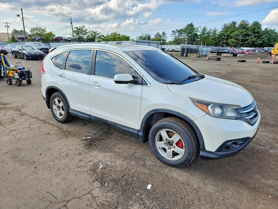 Photo 4 from auction – 2013 HONDA CR-V with VIN 5J6RM4H74DL071544