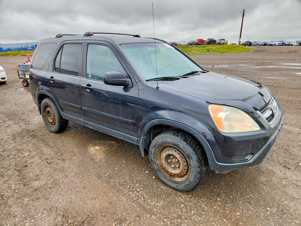 Photo 4 from auction – 2002 HONDA CR-V with VIN JHLRD78902C812555