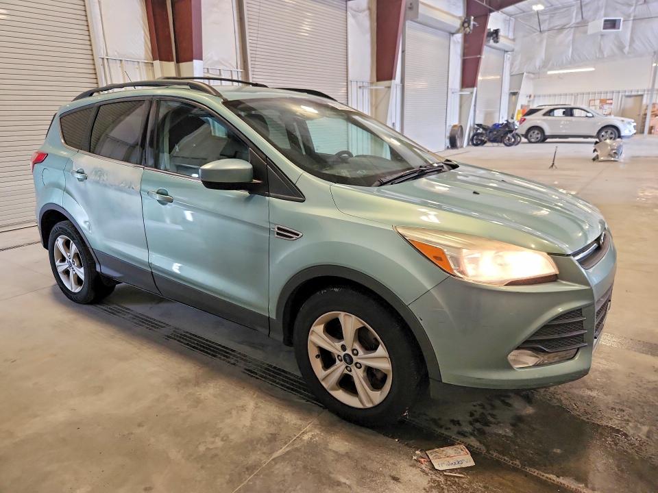 Photo 4 from auction – 2013 FORD ESCAPE with VIN 1FMCU0G93DUD56619