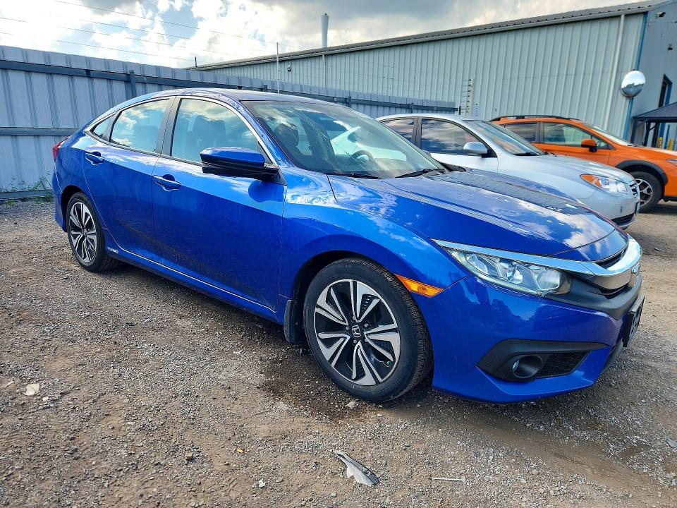 Photo 4 from auction – 2018 HONDA CIVIC with VIN 2HGFC1F44JH107374